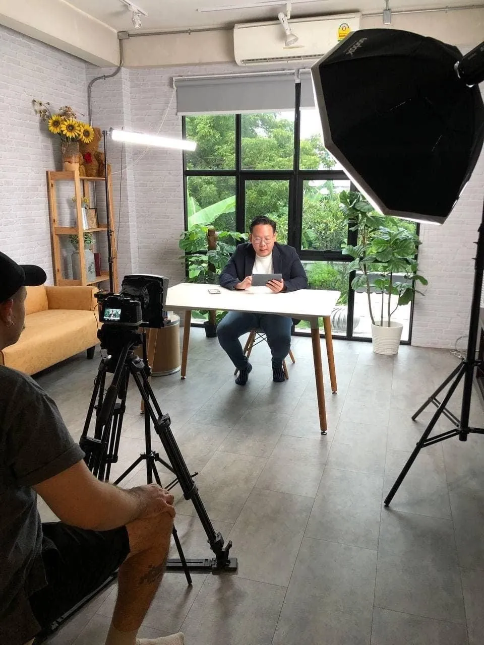 The OXE Marketing crew filming a corporate interview in Bangkok